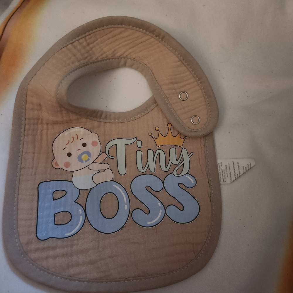 Tan Baby Bib with Blue and White Design